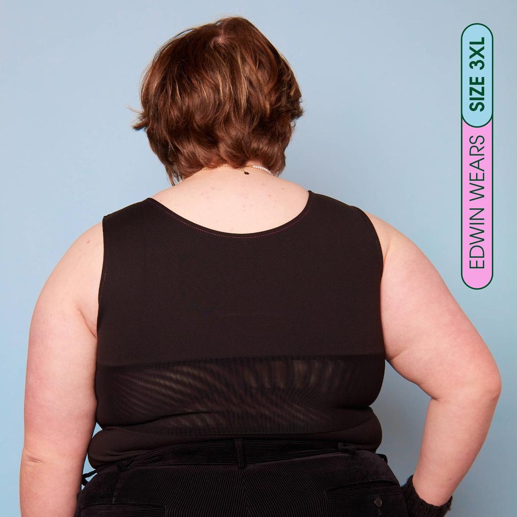 Edwin wearing plus size chest binder - back view with breathable panel