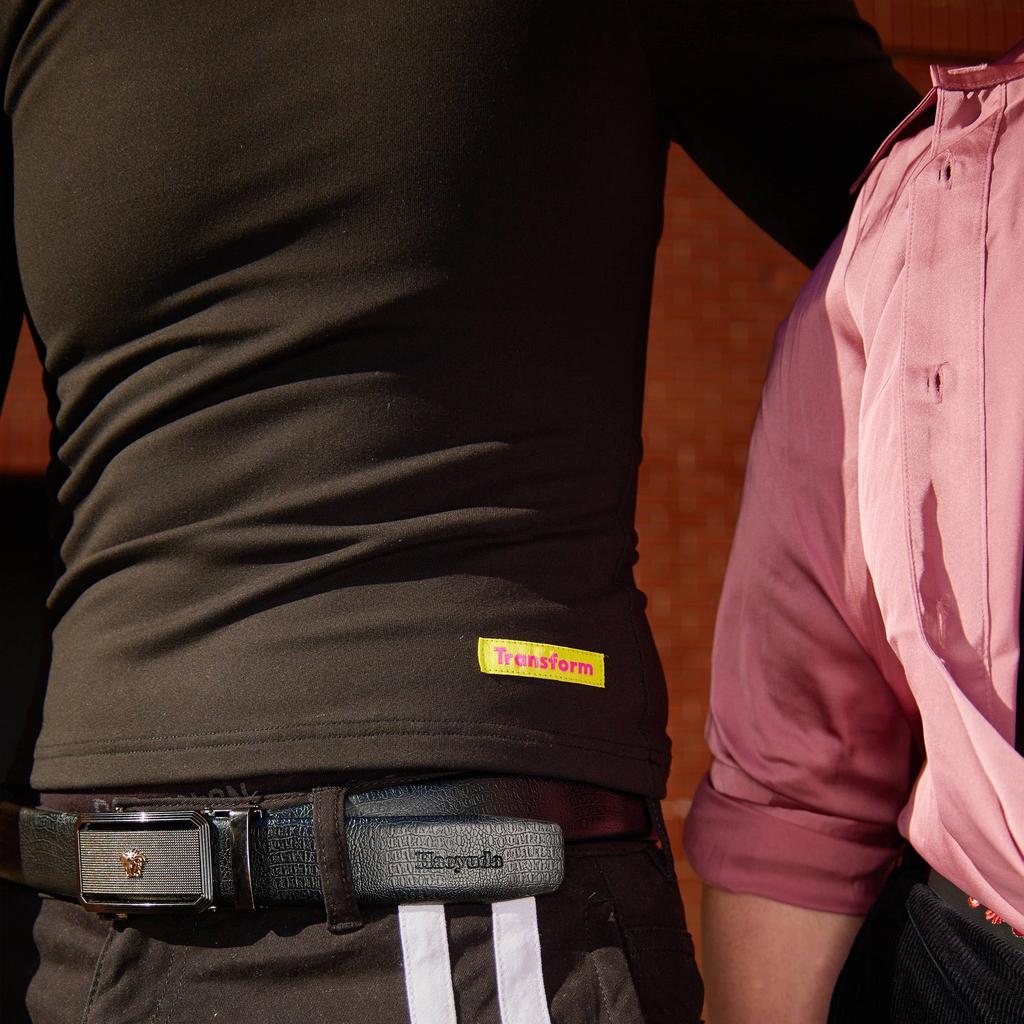 Cole styling our long sleeve compression shirt made from premium, breathable compression fabric - close up view